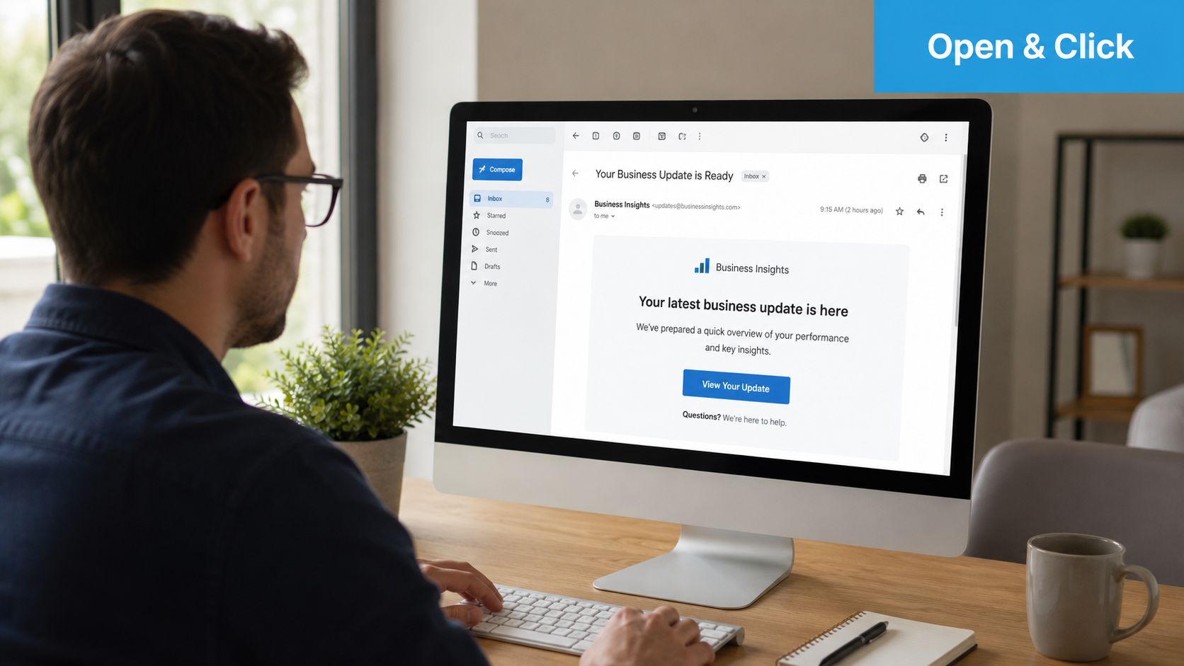 How to Improve Click Through Rate: A 2026 Guide | SharedTEAMS A man sitting at a desk looking at a computer screen displaying a business email with an update link.